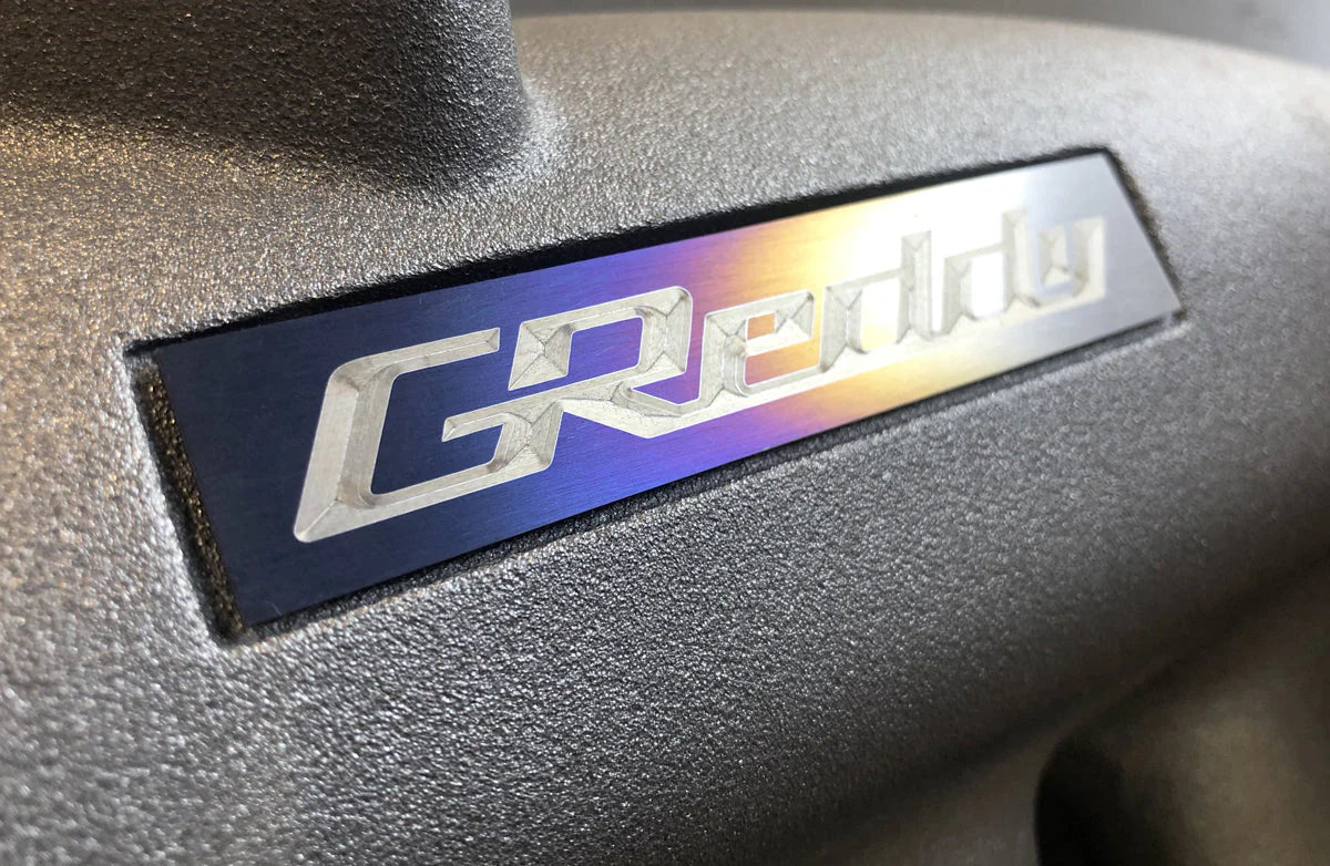GReddy Performance Parts Optional Titanium GReddy Emblem - (105x20mm)