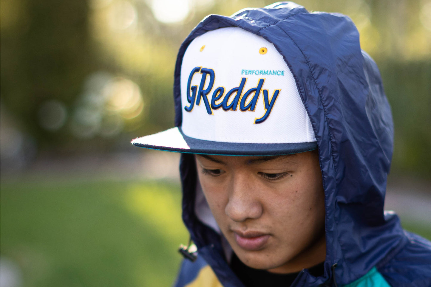 GReddy TRUST Japan GReddy Varsity Script Snap-Back Cap - White and Navy Blue