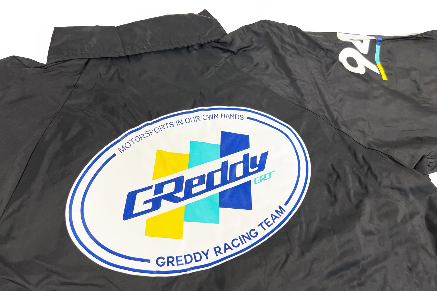GReddy TRUST Japan GReddy Racing Team Oval Lightweight Coaches Jacket - Black - 20525001 - Small Black