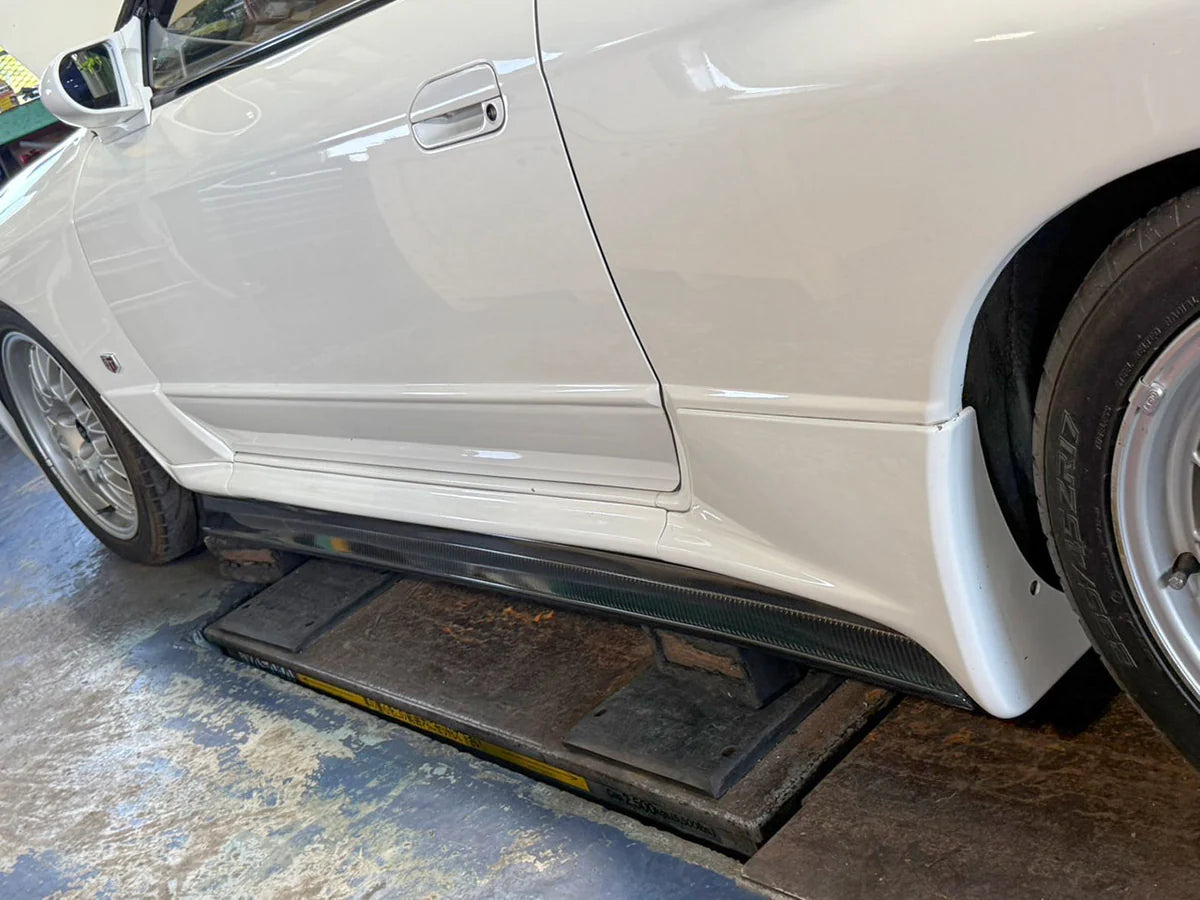 GReddy Performance Parts Garage Active Aero (R32) - Side Under Diffusers (Side Skirts) - 44881413 - Wet Carbon Side Skirts (BNR32)