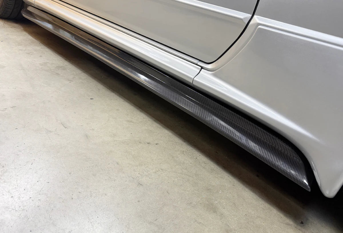 GReddy Performance Parts Garage Active Aero (R32) - Side Under Diffusers (Side Skirts) - 44881413 - Wet Carbon Side Skirts (BNR32)