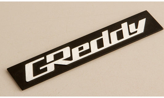 GReddy TRUST Japan ALUMINUM EMBLEM, BLACK AND SILVER FOR 18000202