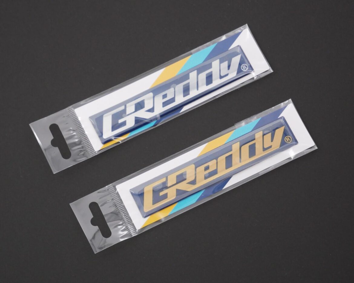 GReddy TRUST Japan GReddy PU Emblem Navy/Gold Logo
